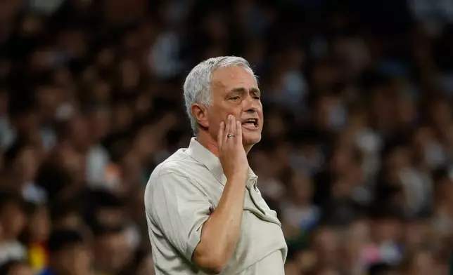Real Madrid's head coach Jose Mourinho gestures during a Spanish La Liga soccer match between Espanyol and Real Madrid in Barcelona, Spain, Saturday, Aug. 22, 2026. (AP Photo/Joan Monfort)