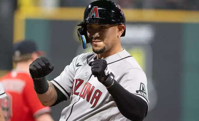 Arizona Diamondbacks' Ildemaro Vargas reacts after hitting an RBI single off Cleveland Guardians relief pitcher Hunter Gaddis during the seventh inning of a baseball game, Saturday, Aug. 1, 2026, in Cleveland. (AP Photo/Phil Long)