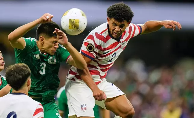 United States' Brandon Dayesr, right, heads the ball next to Mexico's Cristóbal Alfaro during the CONCACAF U-20 final soccer match in Mexico City, Sunday, Aug. 9, 2026. (AP Photo/Fernando Llano)