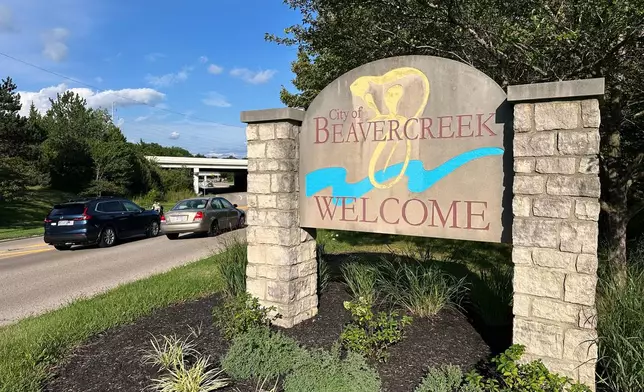 A sign welcomes visitors to Beavercreek, Ohio, Friday, Aug. 14, 2026. (AP Photo/Julie Carr Smyth)