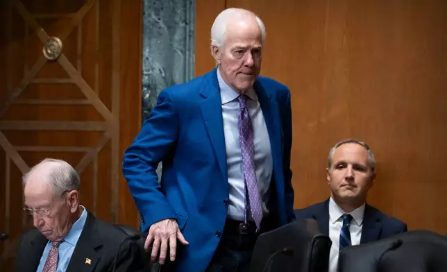 Sen. John Cornyn, R-Texas, arrives for a hearing of the Senate Finance Committee on Capitol Hill, Thursday, July 30, 2026, in Washington. (AP Photo/Mark Schiefelbein)