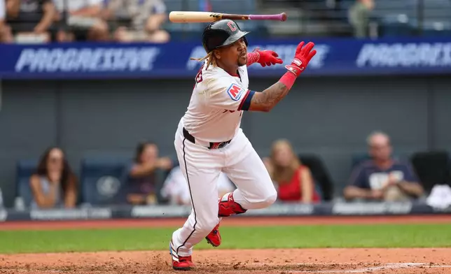 Cleveland Guardians' José Ramírez starts ti run after hitting a single against the Kansas City Royals in the sixth inning of a baseball game in Cleveland, Sunday, Aug. 30, 2026. (AP Photo/Tim Phillis)