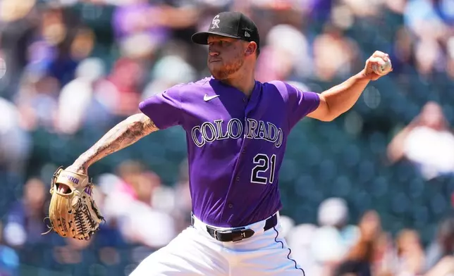 Colorado Rockies starting pitcher Kyle Freeland works against the Kansas City Royals in the first inning of a baseball game Sunday, Aug. 2, 2026, in Denver. (AP Photo/David Zalubowski)