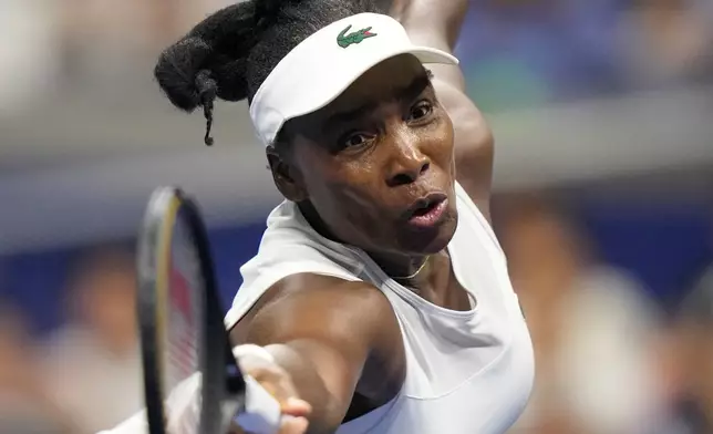 Venus Williams, of the United States, plays a forehand return to to compatriot Sofia Kenin of the United States during their first round match at the U.S. Open tennis championships, Monday, Aug. 31, 2026, in New York. (AP Photo/Frank Franklin II)