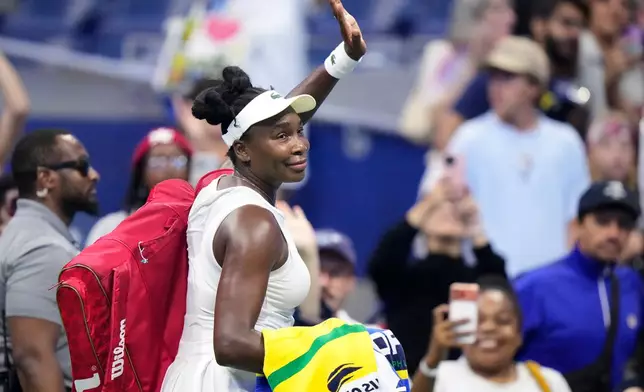 Venus Williams, of the United States, waves as she leaves the court following her first round loss to compatriot Sofia Kenin at the U.S. Open tennis championships, Monday, Aug. 31, 2026, in New York. (AP Photo/Frank Franklin II)