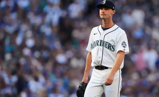 Seattle Mariners starting pitcher Kade Anderson walks back to the dugout after being pulled from the sixth inning of a baseball game against the Chicago Cubs, Saturday, Aug. 22, 2026, in Seattle. (AP Photo/Lindsey Wasson)