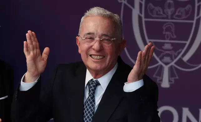Former Colombian President Alvaro Uribe arrives for the inauguration of President Abelardo de la Espriella in Cali, Colombia, Friday, Aug. 7, 2026. (AP Photo/Santiago Saldarriaga)