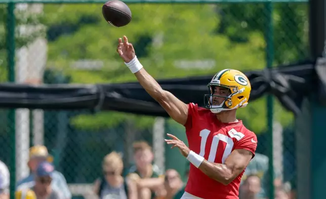 Green Bay Packers quarterback Jordan Love (10) throws a pass during practice at the team's NFL football training camp, Thursday, July 30, 2026, in Green Bay, Wis. (AP Photo/Matt Ludtke)