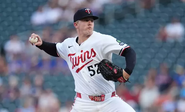 Minnesota Twins starting pitcher Zebby Matthews (52) delivers during the first inning of a baseball game against the Atlanta Braves Tuesday, Aug. 18, 2026, in Minneapolis. (AP Photo/Abbie Parr)