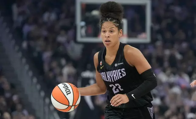 Golden State Valkyries guard Veronica Burton (22) brings the ball up the court against the Dallas Wings during the first half of a WNBA basketball game in San Francisco, Monday, Aug. 17, 2026. (AP Photo/Jeff Chiu)