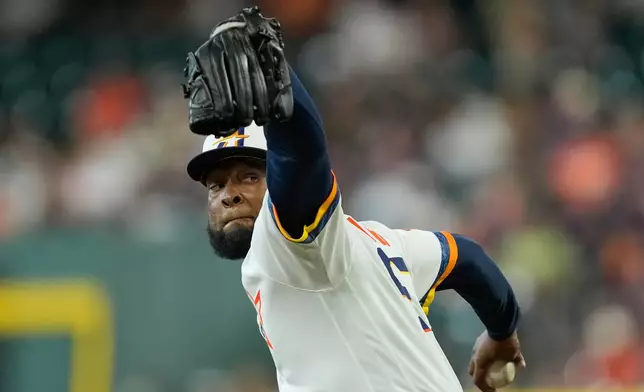 Houston Astros starting pitcher Cristian Javier throws against the Toronto Blue Jays during the first inning of a baseball game Monday, Aug. 3, 2026, in Houston. (AP Photo/David J. Phillip)