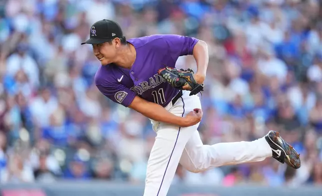 Colorado Rockies starting pitcher Tomoyuki Sugano works against the Los Angeles Dodgers in the first inning of a baseball game Monday, Aug. 17, 2026, in Denver. (AP Photo/David Zalubowski)