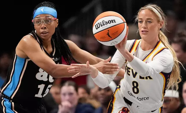 Indiana Fever guard Sophie Cunningham (8) passes in the first half of an WNBA basketball game against the Atlanta Dream Sunday, Aug. 16, 2026, in Atlanta. (AP Photo/Brynn Anderson)