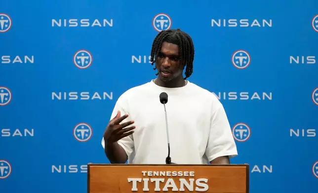 Tennessee Titans quarterback Cam Ward speaks during a news conference after a preseason NFL football game against the Seattle Seahawks, Sunday, Aug. 23, 2026, in Nashville, Tenn. (AP Photo/George Walker IV)