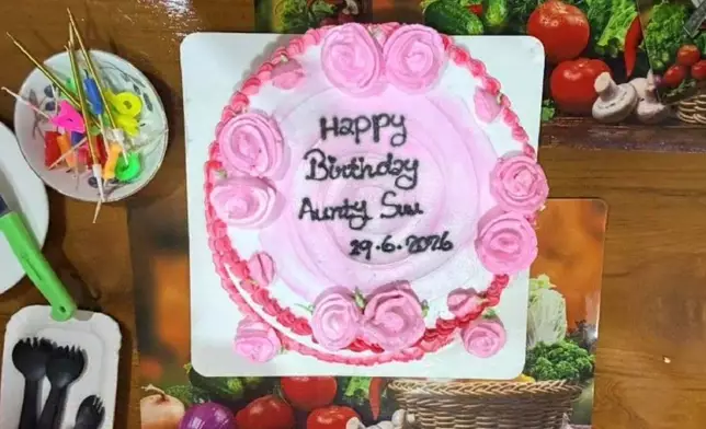 In this photo released by Myanmar President Office on Monday, Aug. 3, 2026, a birthday cake for Myanmar ousted leader Aung San Suu Kyi is seen during her meeting with Arnaud de Baecque, resident representative of the International Committee of the Red Cross, in Naypyitaw, Myanmar. (Myanmar President Office via AP)