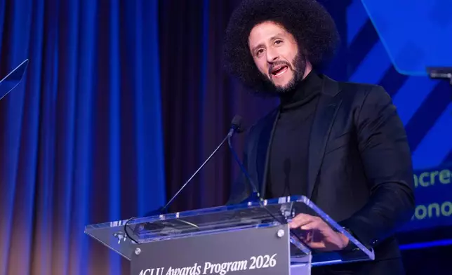 FILE - Colin Kaepernick speaks after receiving the ACLU Ralph Ellison Award for Defenders of Civil Rights and Civil Liberties in the Arts, Business, Science, and Sports at the ACLU's 2026 Biennial Leadership Conference, Friday, July 24, 2026, in Washington. (AP Photo/Kevin Wolf, File)