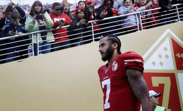 FILE - San Francisco 49ers quarterback Colin Kaepernick (7) walks out of a tunnel before an NFL football game against the Seattle Seahawks in Santa Clara, Calif., Sunday, Jan. 1, 2017. (AP Photo/Marcio Jose Sanchez, File)