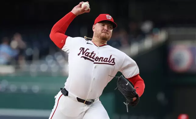 Washington Nationals pitcher Cade Cavalli throws during the first inning of a baseball game against the Colorado Rockies in Washington, Monday, Aug. 24, 2026. (AP Photo/Terrance Williams)