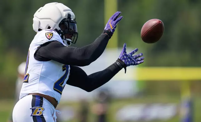 Baltimore Ravens running back Derrick Henry (22) practices his receiving during a joint NFL football practice with the Minnesota Vikings, Wednesday, Aug 19, 2026, in Eagan, Minn. (Alex Kormann/Minnesota Star Tribune via AP)