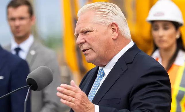 Ontario Premier Doug Ford speaks to media at a housing development in Hamilton, Ontario, Canada on Monday, Aug. 24, 2026. (Nick Iwanyshyn/The Canadian Press via AP)