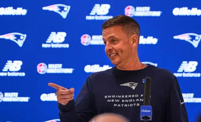 New England Patriots Executive Vice President of Player Personnel Eliot Wolf gestures during a media availability prior to an NFL football training camp, Tuesday, Aug. 25, 2026, in Foxborough, Mass. (AP Photo/Charles Krupa)