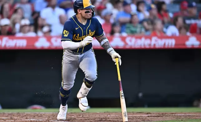 Milwaukee Brewers' William Contreras runs after hitting a double during the third inning of a baseball game against the Los Angeles Angels, Saturday, Aug. 1, 2026, in Anaheim, Calif. (AP Photo/William Liang)