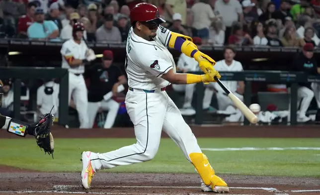 Arizona Diamondbacks' Gabriel Moreno hits a double against the San Diego Padres in the first inning of a baseball game, Thursday, Aug 6, 2026, in Phoenix. (AP Photo/Rick Scuteri)