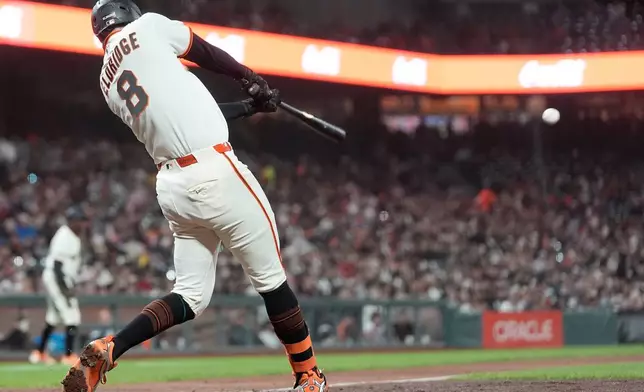 San Francisco Giants' Bryce Eldridge hits a two-run single against the Arizona Diamondbacks during the fifth inning of the second baseball game of a doubleheader, Saturday, Aug. 29, 2026, in San Francisco. (AP Photo/Jeff Chiu)