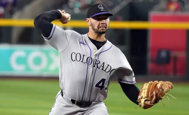 Colorado Rockies pitcher Gabriel Hughes throws against the Arizona Diamondbacks in the first inning of a baseball game, Monday, Aug 10, 2026, in Phoenix. (AP Photo/Rick Scuteri)