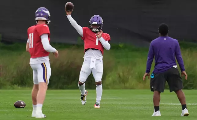 Minnesota Vikings quarterback Kyler Murray (1) throws during a joint NFL football practice with the Baltimore Ravens, Thursday, Aug. 20, 2026, in Eagan, Minn. (AP Photo/Abbie Parr)