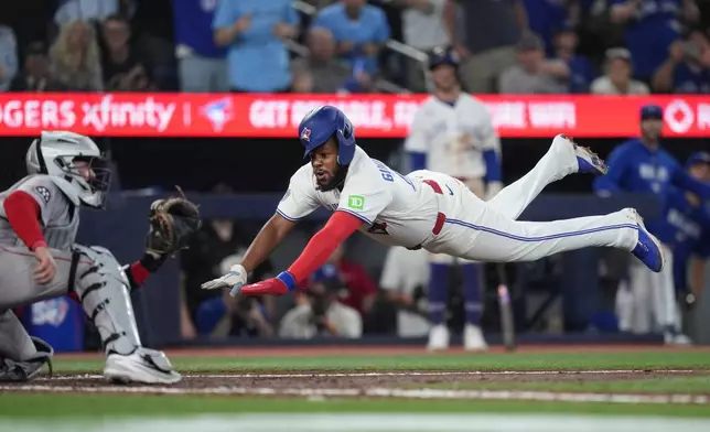 Toronto Blue Jays first baseman Vladimir Guerrero Jr. (27) reacts to the Boston Red Sox dugout after hitting into a double play during fifth inning American League MLB baseball action in Toronto on Wednesday, August 12, 2026. (Nathan Denette/The Canadian Press via AP)