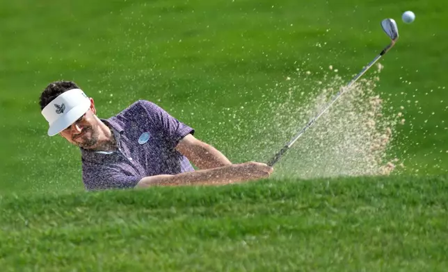 Beau Hossler hits from a sand trap on the ninth hole during the final round of the Wyndham Championship golf tournament in Greensboro, N.C., Sunday, Aug. 9, 2026. (AP Photo/Chuck Burton)