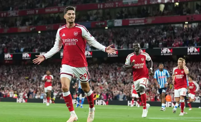 Arsenal's Kai Havertz celebrates after scoring the opening goal during the English Premier League soccer match between Arsenal and Coventry City in London, Friday, Aug. 21, 2026. (AP Photo/Kirsty Wigglesworth)