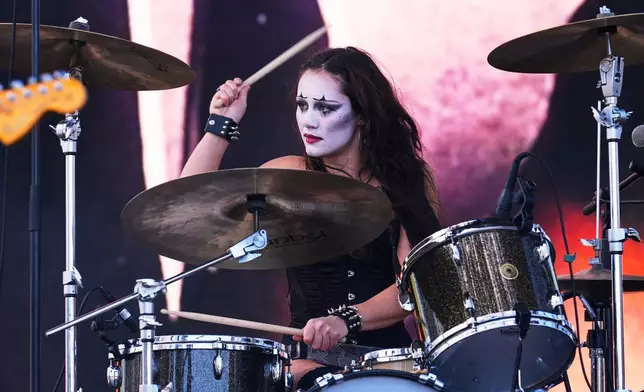 Drummer Chloe de St. Aubin of Die Spitz performs at the Daisy Chain Fields Music Festival on Saturday, Aug. 29, 2026, at Great Park in Irvine, Calif. (AP Photo/Chris Pizzello)