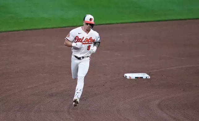 Baltimore Orioles' Tyler O'Neill (9) rounds the bases after hitting a two-run home run during the fourth inning of a baseball game against the Los Angeles Angels, Wednesday, Aug. 5, 2026, in Baltimore. (AP Photo/Stephanie Scarbrough)