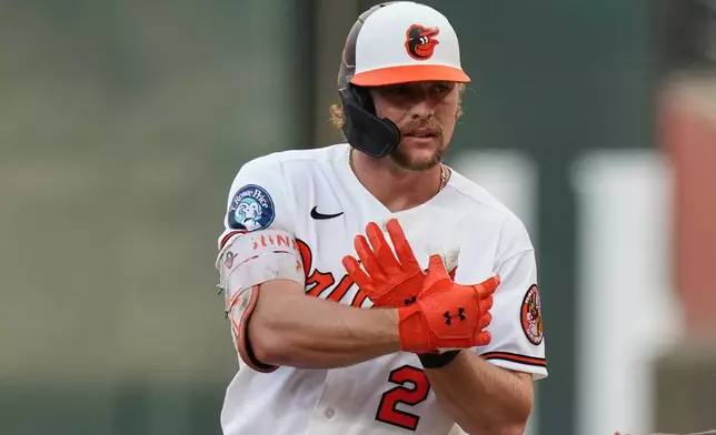 Baltimore Orioles' Gunnar Henderson (2) celebrates after hitting a single during the first inning of a baseball game against the Los Angeles Angels, Wednesday, Aug. 5, 2026, in Baltimore. (AP Photo/Stephanie Scarbrough)