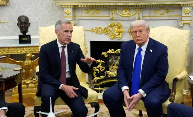 FILE - Canada Prime Minister Mark Carney and President Donald Trump hold a press conference at the White House in Washington, D.C., Oct. 7, 2025. (Adrian Wyld/The Canadian Press via AP, File)