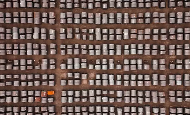 Rolled coils of steel sit in the yard at the ArcelorMittal Dofasco steel plant in Hamilton, Ont. on Thursday, Aug. 20, 2026. (Nick Iwanyshyn /The Canadian Press via AP)