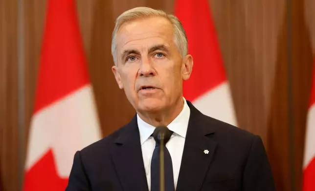 Prime Minister Mark Carney speaks about Canada's response to new U.S. tariffs during a news conference on Parliament Hill in Ottawa on Saturday, Aug. 22, 2026. (Patrick Doyle/The Canadian Press via AP)