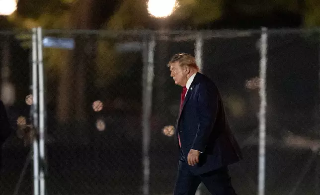 President Donald Trump walks on the Ellipse as he arrives on Marine One near the White House, Friday, Aug. 21, 2026, in Washington. (AP Photo/Manuel Balce Ceneta)