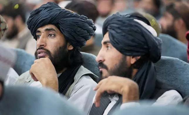 Taliban delegates from across the country gather during a meeting that opens celebrations marking the fifth anniversary of the U.S. withdrawal and the start of Taliban rule, at the Loya Jirga Hall in Kabul, Afghanistan, Saturday, Aug. 15, 2026. (AP Photo/Siddiqullah Alizai)