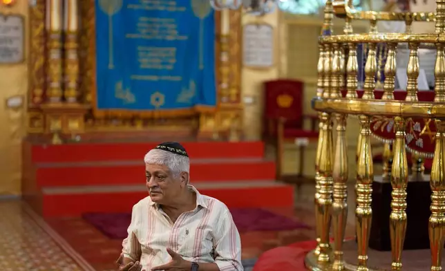 Elias Josephai, a Malabari Jew, speaks to his guests at the 12th-century Kadavumbagam Synagogue in Ernakulam, mainland district of Kochi, India, Thursday, May 21, 2026. (AP Photo/Aijaz Rahi)