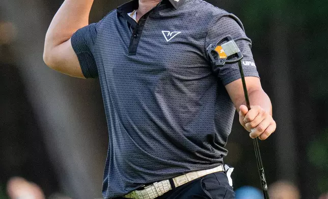 Michael La Sasso, of Hyflyers GC, celebrates after his putt on the 18th green during the final round of LIV Golf Indianapolis, Sunday, Aug. 23, 2026, in Westfield, Ind. (Montana Pritchard/LIV Golf via AP)