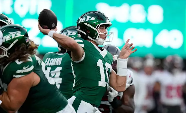 New York Jets quarterback Cade Klubnik (10) throws a pass during the first half of a preseason NFL football game against the Tampa Bay Buccaneers, Friday, Aug. 14, 2026, in East Rutherford, N.J. (AP Photo/Seth Wenig)