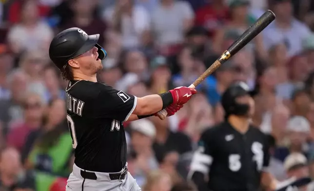 Chicago White Sox's Chase Meidroth watches his two-run home run during the third inning of a baseball game against the Boston Red Sox, Thursday, Aug. 6, 2026, in Boston. (AP Photo/Charles Krupa)