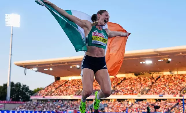 Ireland's Kate O'Connor celebrates after winning the gold medal in the heptathlon at the European Athletics Championships in Birmingham, England, Saturday, Aug. 15, 2026. (AP Photo/Petr David Josek)