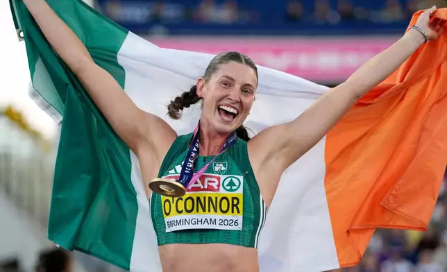 Ireland's Kate O'Connor celebrates after winning the gold medal in the heptathlon at the European Athletics Championships in Birmingham, England, Saturday, Aug. 15, 2026. (AP Photo/Matthias Schrader)