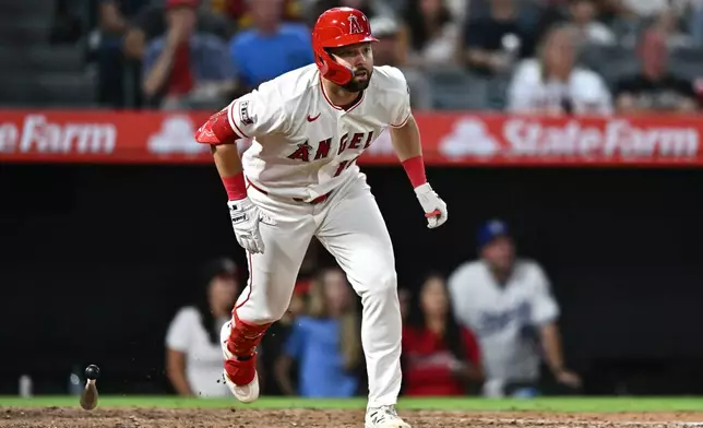 Los Angeles Angels' Nolan Schanuel runs after hitting a single during the sixth inning of a baseball game against the Kansas City Royals, Saturday, Aug. 15, 2026, in Anaheim, Calif. (AP Photo/William Liang)