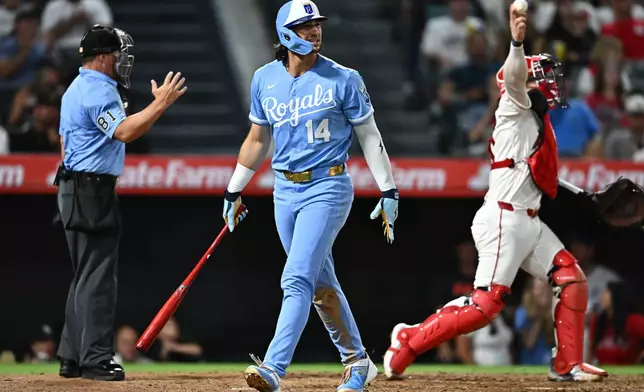 Kansas City Royals' Jac Caglianone (14) reacts after striking out during the seventh inning of a baseball game against the Los Angeles Angels, Saturday, Aug. 15, 2026, in Anaheim, Calif. (AP Photo/William Liang)