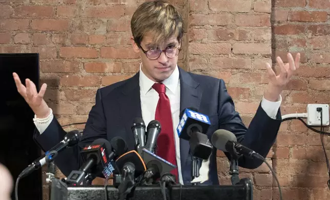 FILE - Milo Yiannopoulos speaks during a news conference in New York, Feb. 21, 2017. (AP Photo/Mary Altaffer, File)